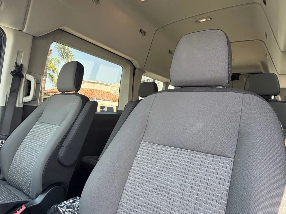 Ford Transit Passenger Wagon XLT T-350 HD 148" EL High Roof DRW AWD 2026 — side view