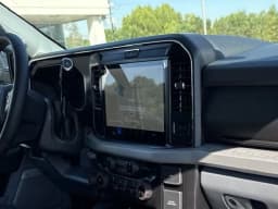 Ford Super Duty F-250 SRW XLT 4WD Crew Cab 6.75' Box 2027 — side view