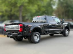Ford Super Duty F-350 DRW Platinum 4WD Crew Cab 8' Box 2026 — side view