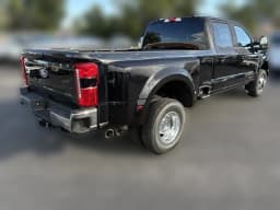 Ford Super Duty F-350 DRW LARIAT 4WD Crew Cab 8' Box 2027 — side view