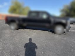 Ford Super Duty F-350 DRW LARIAT 4WD Crew Cab 8' Box 2027 — side view