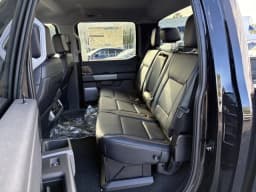 Ford Super Duty F-350 DRW LARIAT 4WD Crew Cab 8' Box 2027 — side view