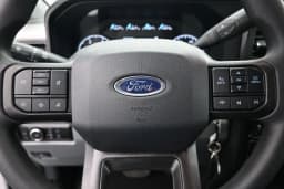 Ford Super Duty F-350 DRW XLT 4WD Crew Cab 8' Box 2026 — side view