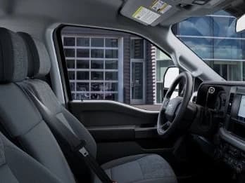Ford Super Duty F-250 SRW XLT 4WD Reg Cab 8' Box 2027 — side view