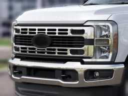 Ford Super Duty F-250 SRW XLT 4WD Reg Cab 8' Box 2027 — side view