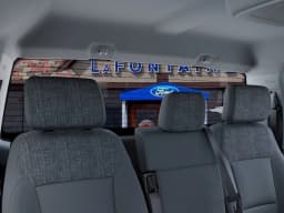 Ford Super Duty F-250 SRW XLT 4WD Reg Cab 8' Box 2027 — side view