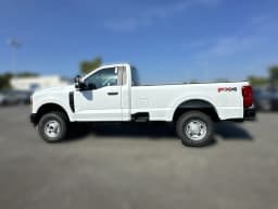 Ford Super Duty F-250 SRW XL 4WD Reg Cab 8' Box 2027 — side view