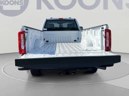 Ford Super Duty F-250 SRW XL 4WD Reg Cab 8' Box 2027 — side view