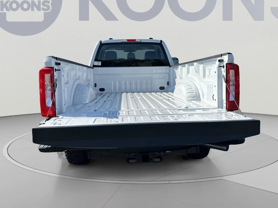 Ford Super Duty F-250 SRW XL 4WD Reg Cab 8' Box 2027 — side view