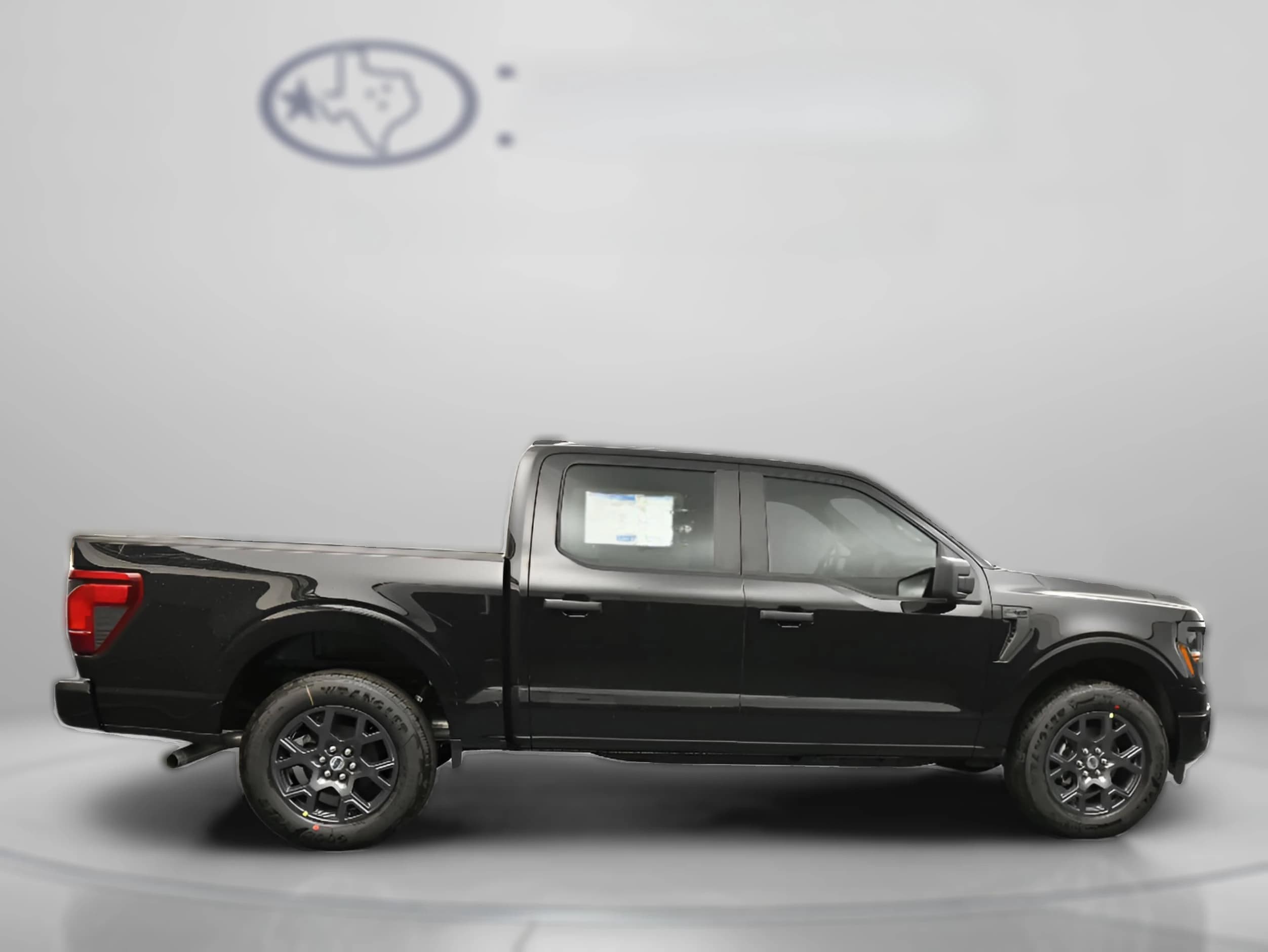 Ford F-150 STX 2WD SuperCrew 5.5' Box 2026 — side view