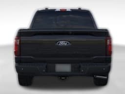 Ford F-150 XLT 4WD SuperCrew 5.5' Box 2026 — side view