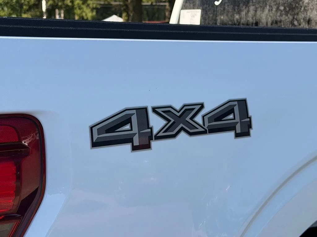 Ford F-150 STX 4WD SuperCab 6.5' Box 2026 — side view