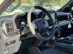 Ford F-150 STX 4WD SuperCab 6.5' Box 2026 — side view