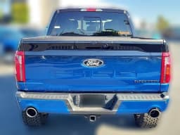 Ford F-150 XLT 4WD SuperCrew 5.5' Box 2025 — side view