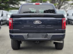Ford F-150 XLT 4WD SuperCrew 5.5' Box 2026 — side view