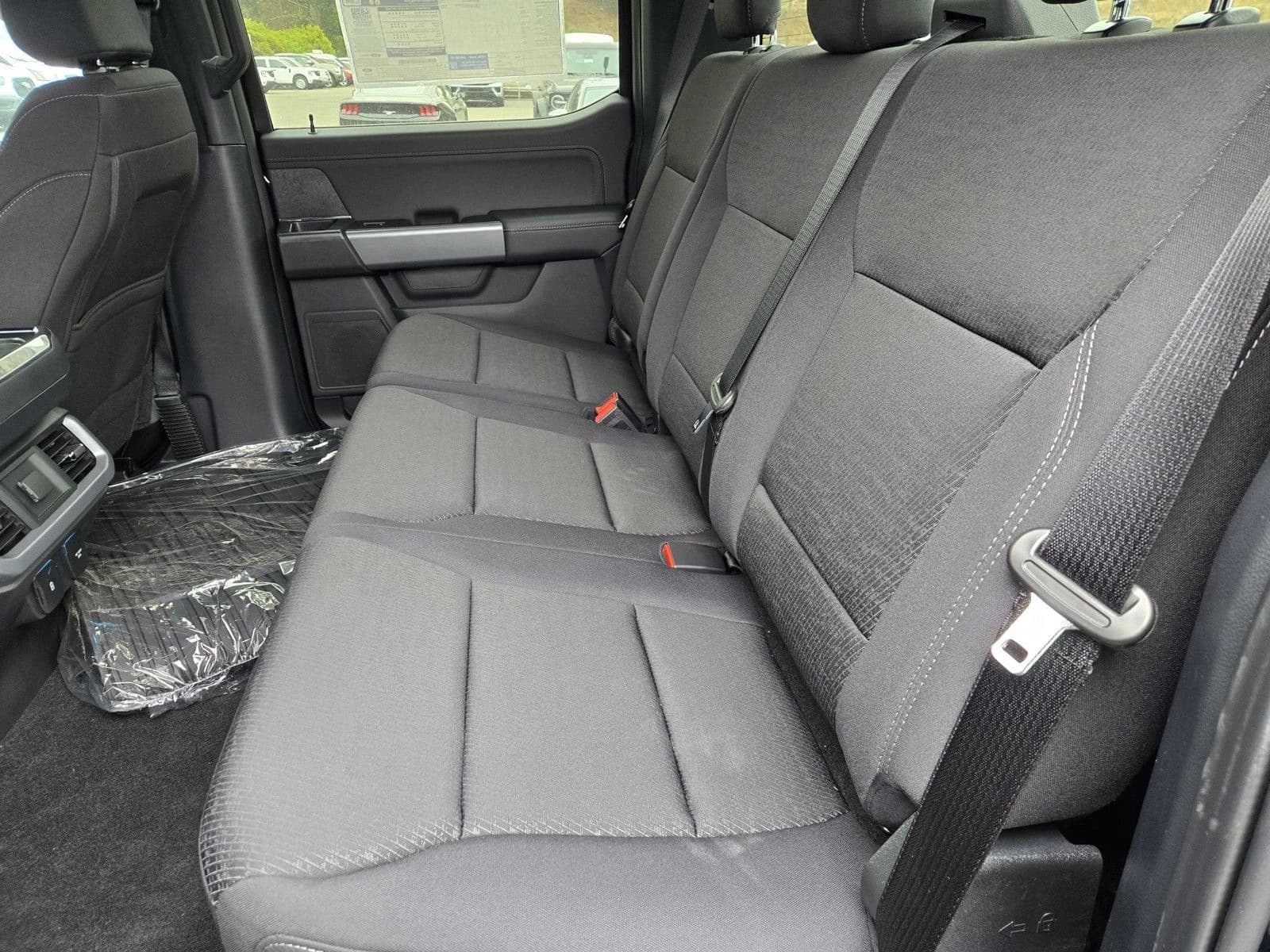 Ford F-150 XLT 4WD SuperCrew 5.5' Box 2026 — side view