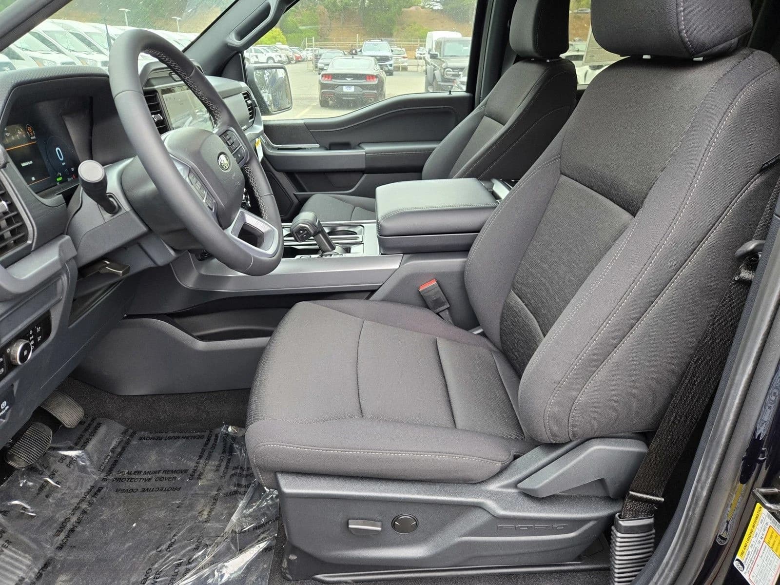 Ford F-150 XLT 4WD SuperCrew 5.5' Box 2026 — side view
