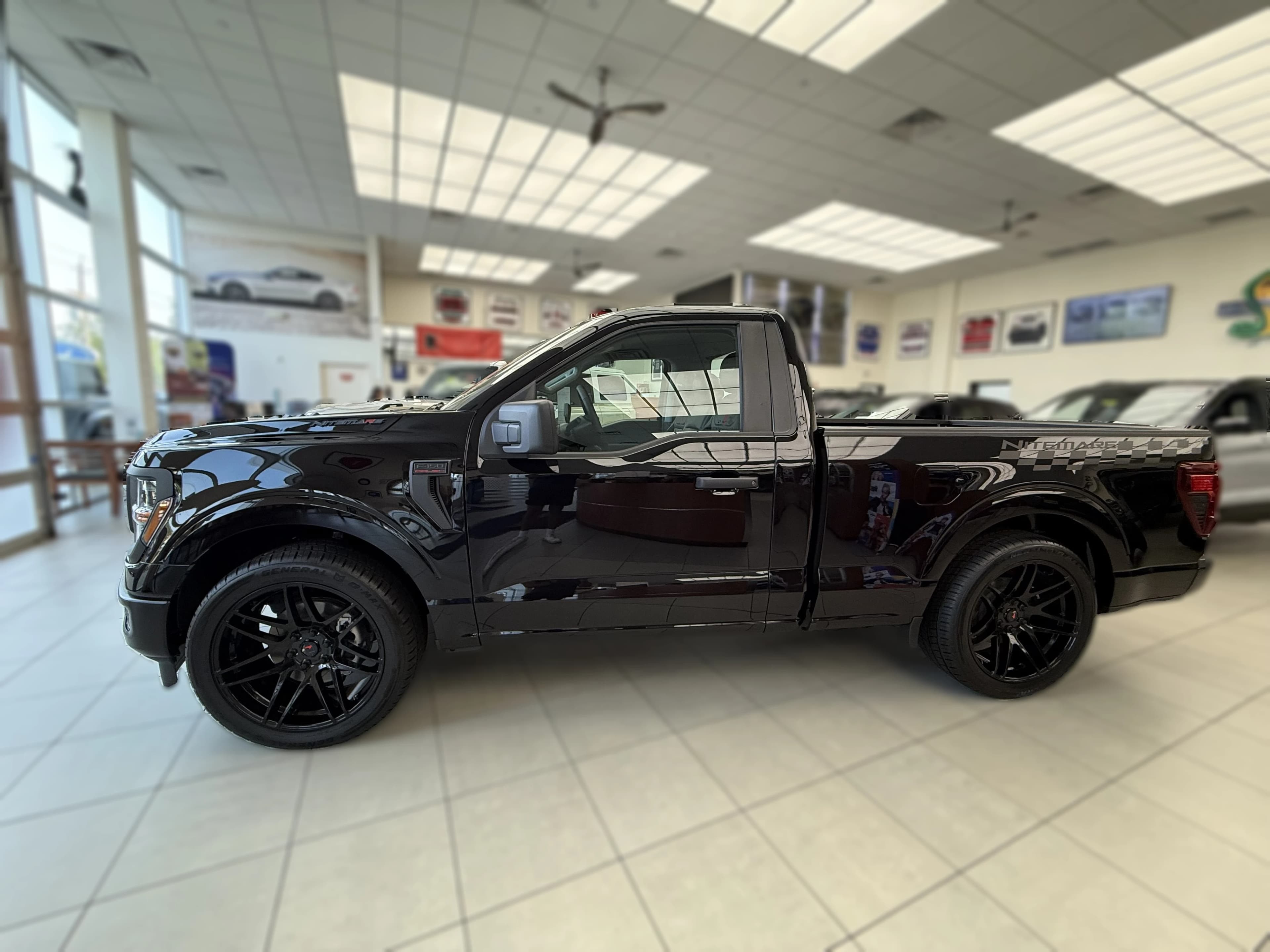 Ford F-150 XL 4WD Reg Cab 6.5' Box 2026 — side view