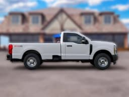 Ford Super Duty F-350 SRW XL 4WD Reg Cab 8' Box 2027 — side view