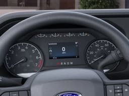 Ford Super Duty F-350 SRW XLT 4WD Reg Cab 8' Box 2027 — side view