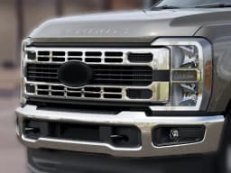 Ford Super Duty F-350 SRW XLT 4WD Reg Cab 8' Box 2027 — side view