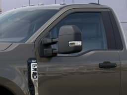 Ford Super Duty F-350 SRW XLT 4WD Reg Cab 8' Box 2027 — side view