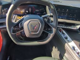 Chevrolet Corvette 1LT 2dr Stingray Cpe 2027 — side view