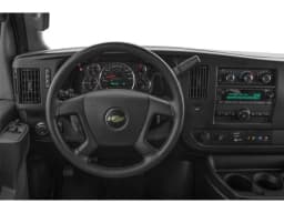 Chevrolet Express Passenger LT RWD 3500 155" 2026 — side view