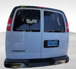 Chevrolet Express Passenger LT RWD 3500 155" 2026 — side view