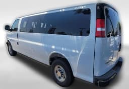 Chevrolet Express Passenger LT RWD 3500 155" 2026 — side view