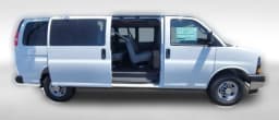 Chevrolet Express Passenger LT RWD 3500 155" 2026 — side view