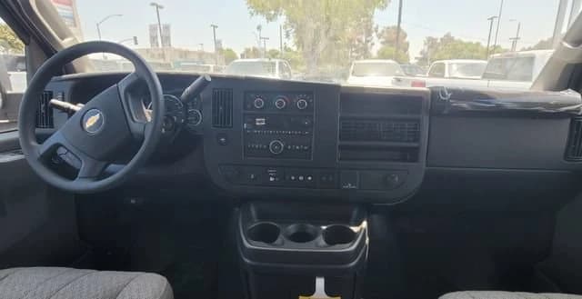 Chevrolet Express Passenger LT RWD 3500 155" 2026 — side view