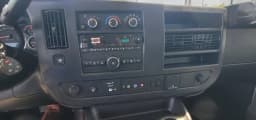 Chevrolet Express Passenger LT RWD 3500 155" 2026 — side view