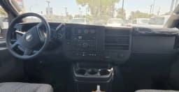 Chevrolet Express Passenger LT RWD 3500 155" 2026 — side view