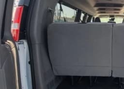Chevrolet Express Passenger LT RWD 3500 155" 2026 — side view