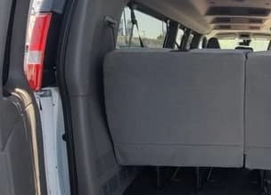 Chevrolet Express Passenger LT RWD 3500 155" 2026 — side view