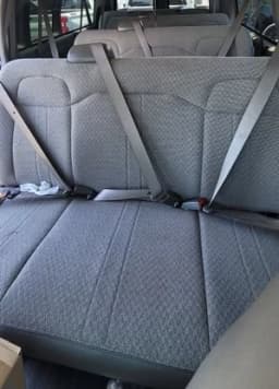 Chevrolet Express Passenger LT RWD 3500 155" 2026 — side view