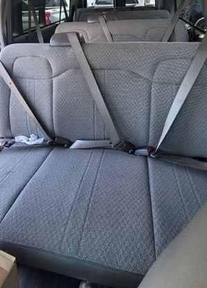 Chevrolet Express Passenger LT RWD 3500 155" 2026 — side view