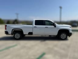 Chevrolet Silverado 2500HD Work Truck 2WD Crew Cab 172" 2026 — side view