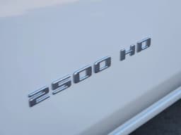Chevrolet Silverado 2500HD Work Truck 4WD Crew Cab 159" 2026 — side view