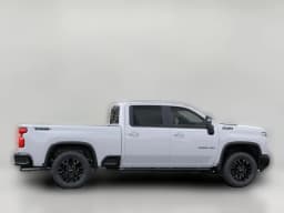 Chevrolet Silverado 2500HD LT 4WD Crew Cab 159" 2026 — side view