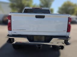 Chevrolet Silverado 2500HD LT 4WD Crew Cab 159" 2026 — side view