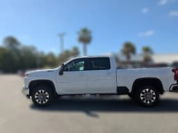 Chevrolet Silverado 2500HD LT 4WD Crew Cab 159" 2026 — side view