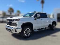 Chevrolet Silverado 2500HD LT 4WD Crew Cab 159" 2026 — side view