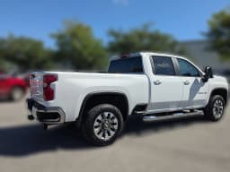 Chevrolet Silverado 2500HD LT 4WD Crew Cab 159" 2026 — side view