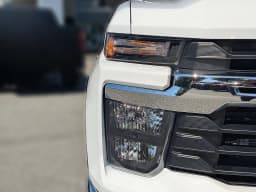 Chevrolet Silverado 2500HD LT 4WD Crew Cab 159" 2026 — side view