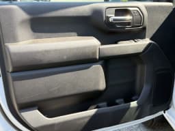 Chevrolet Silverado 2500HD Work Truck 4WD Reg Cab 142" 2026 — side view