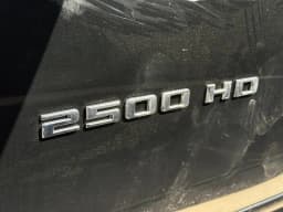 Chevrolet Silverado 2500HD Custom 4WD Crew Cab 159" 2026 — side view