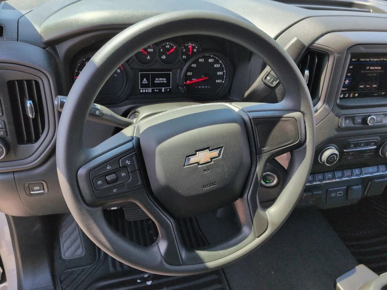 Chevrolet Silverado 2500HD Custom 4WD Crew Cab 159" 2026 — side view