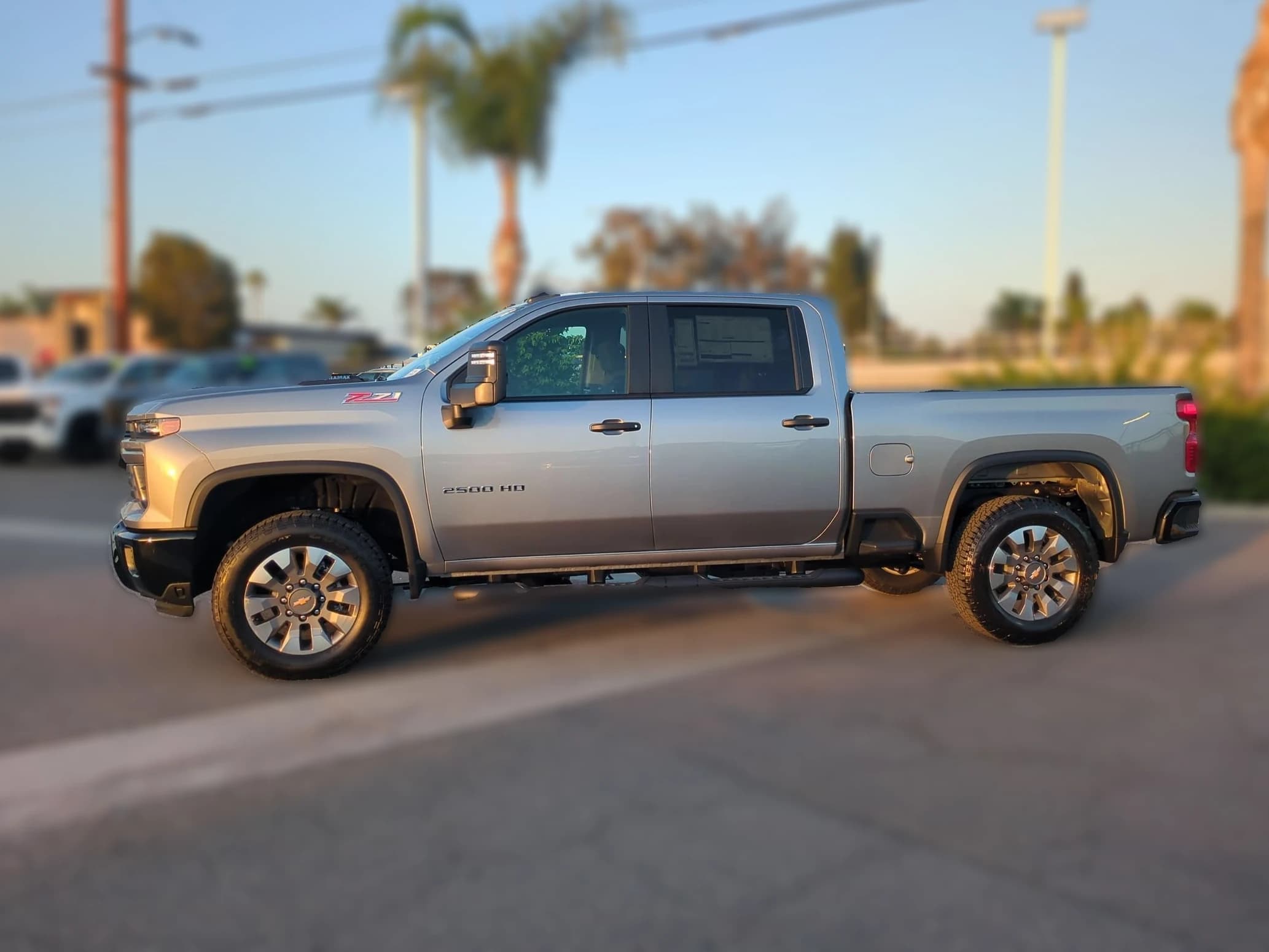 Chevrolet Silverado 2500HD Custom 4WD Crew Cab 159" 2026 — side view